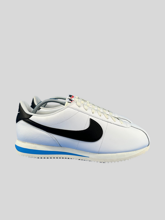 Size 10.5 men/ 12 women - Nike Cortez